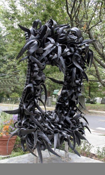 Booker, Like, 2009, rubber tire and stainles steel, 108 x 66 x 48 in, NON 49 583